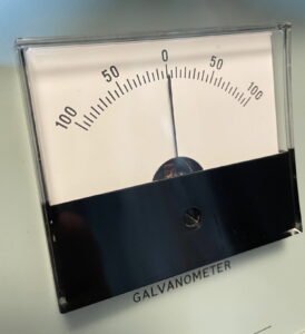 The galvanometer works on the principle of electrical current flowing through a coil in a magnetic field.