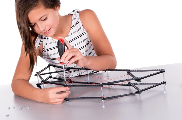 Prospective engineer building a cantilever bridge.